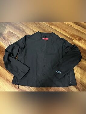 Nike women’s oversized Black Lightweight Collarless boxy Jacket